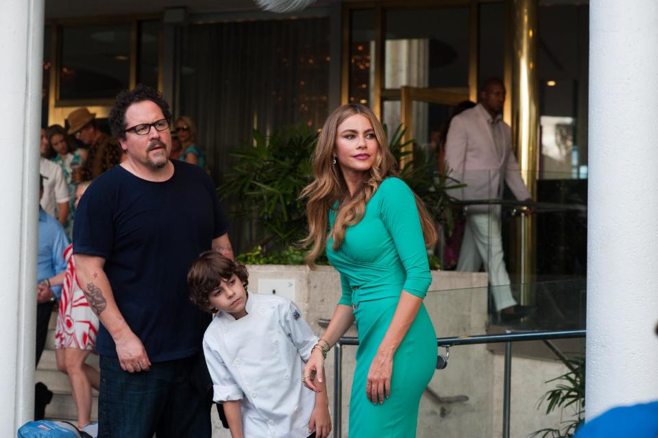 This image released by Open Road Films shows Jon Favreau, from left, Emjay Anthony and Sofia Vergara in a scene from "Chef." (AP Photo/Open Road Films, Merrick Morton)