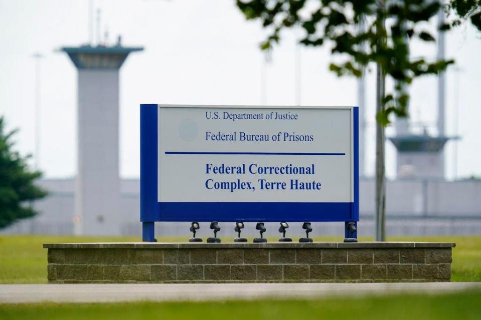 FILE - This Aug. 28, 2020, file photo shows the federal prison complex in Terre Haute, Ind. (AP Photo/Michael Conroy, File)A federal judge said the Justice Department unlawfully rescheduled the execution of the only woman on federal death row, potentially setting up the Trump administration to schedule the execution after president-elect Joe Biden takes office. U.S. District Court Judge Randolph Moss also vacated an order from the director of the Bureau of Prisons that had set Lisa Montgomery's execution date for Jan. 12, 2021.