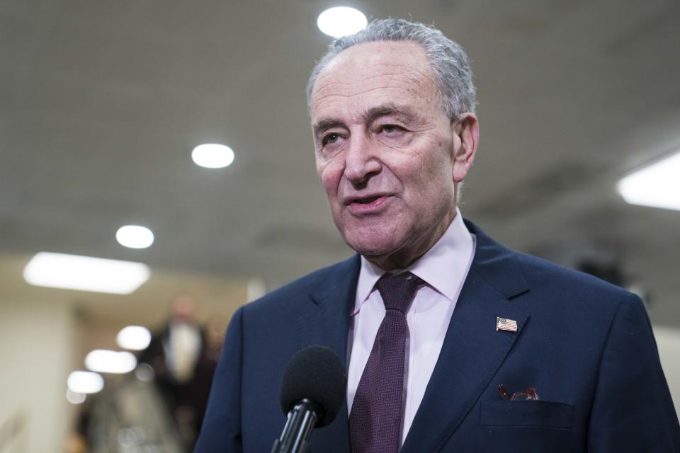 Senate Minority Leader Sen. Chuck Schumer, D-N.Y., speaks to reporters near the Senate subway in the U.S. Capitol on Monday.