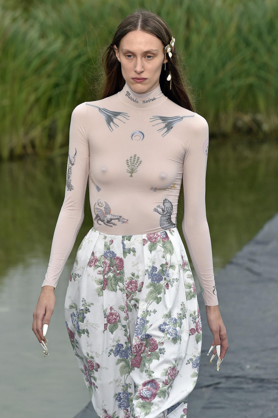 PARIS, FRANCE - SEPTEMBER 24: A model walks the runway during the Marine Serre Womenswear Spring/Summer 2020 show as part of Paris Fashion Week on September 24, 2019 in Paris, France. (Photo by Aurelien Meunier/Getty Images)