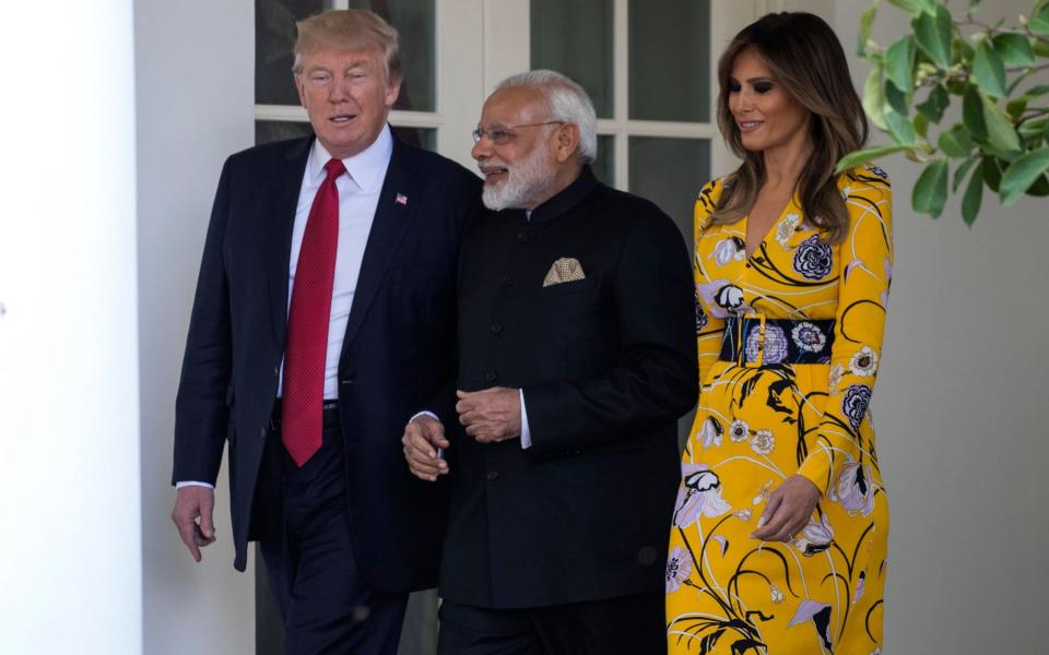 US President Donald J. Trump (L) and First Lady Melania Trump (R) walk to the Oval Office with Indian Prime Minister Narendra Modi (R) after his arrival to the White House in Washington, DC, USA, 26 June 2017 - Credit: EPA