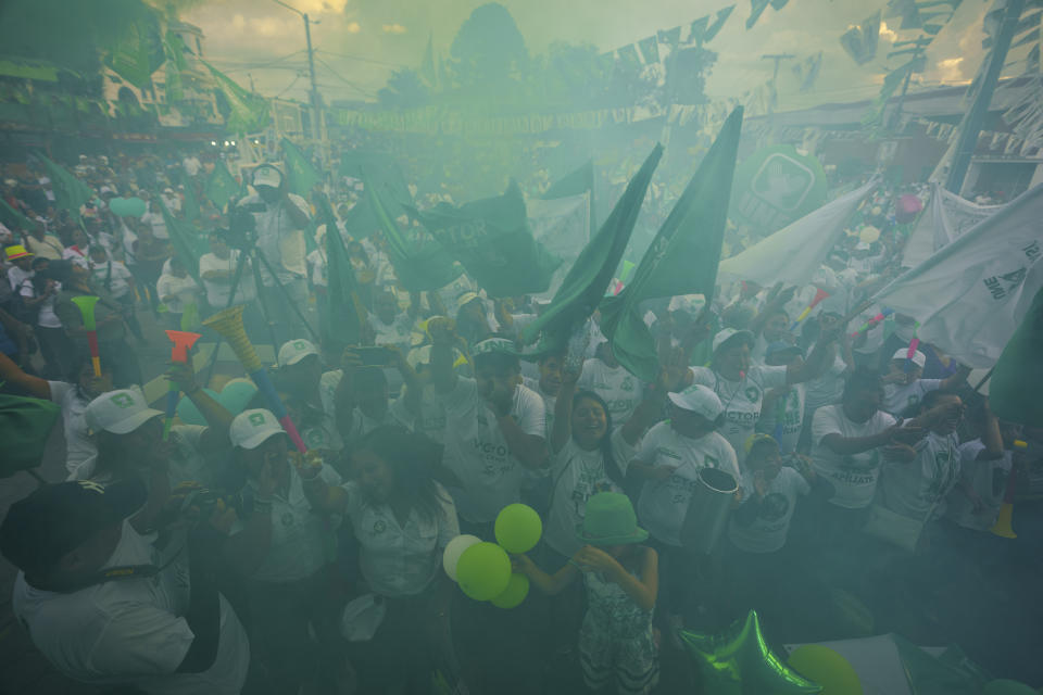 Supporters wait for Sandra Torres, presidential candidate of the National Unity of Hope party, UNE, to apprear at a campaign rally in Santa Catarina Pinula, Guatemala, Saturday, June 17, 2023. Guatemalans go to the polls June 25. (AP Photo/Moises Castillo)