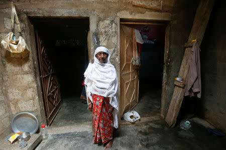 ?Hoor Bahar, 60, a Rohingya immigrant living in Pakistan, poses for a photograph during an interview with Reuters at her residence in Arkanabad neighborhood in Karachi, Pakistan September 7, 2017. Picture taken September 7, 2017. REUTERS/Akhtar Soomro