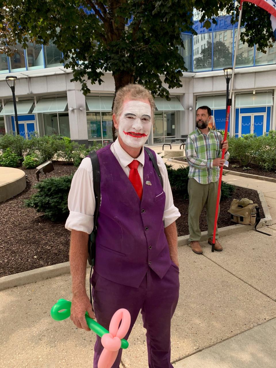 A man dressed as the Joker was across from the 3rd Street Market Hall on Tuesday, July 16, 2024.