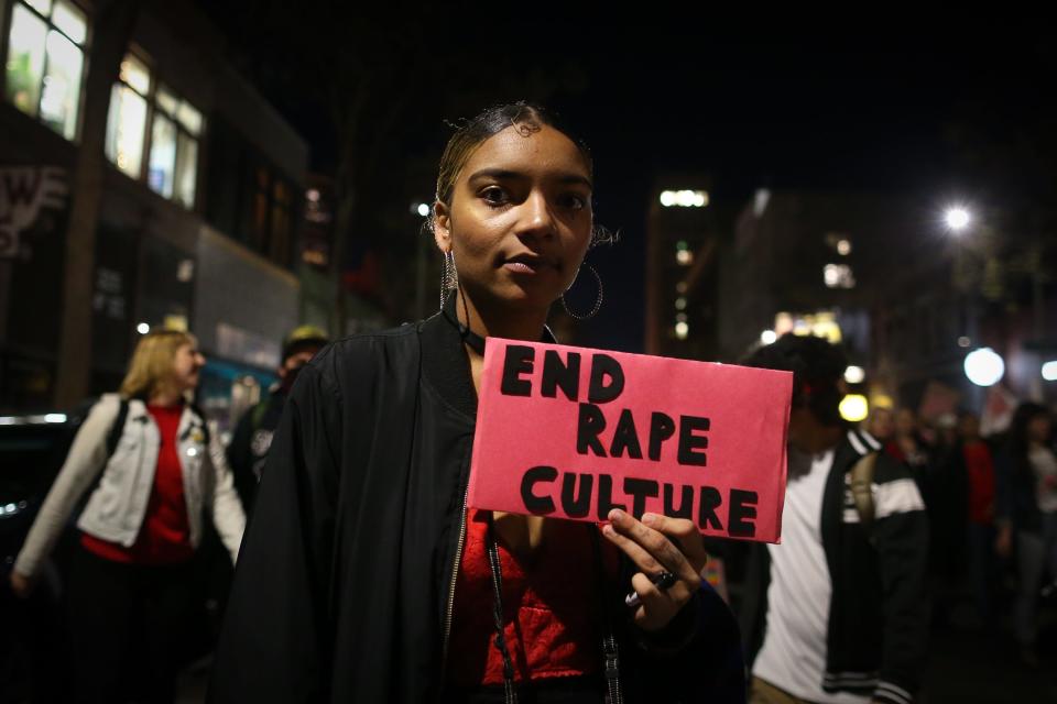 A woman rallies against sexual assault on International Women's Day on March 8, 2017, in Oakland, California.