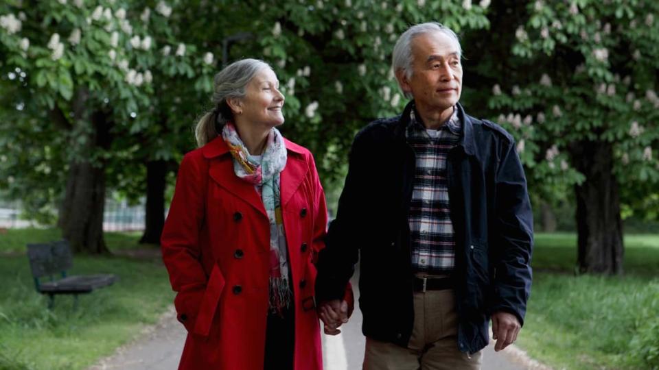 Elderly couple walking in the park