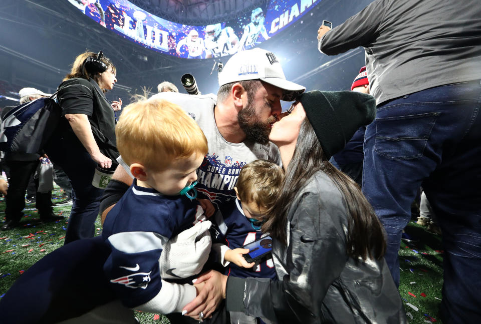<p>James Develin #46 of the New England Patriots celebrates with his family after his teams 13-3 win over the Los Angeles Rams during Super Bowl LIII at Mercedes-Benz Stadium on February 03, 2019 in Atlanta, Georgia. (Photo by Al Bello/Getty Images) </p>