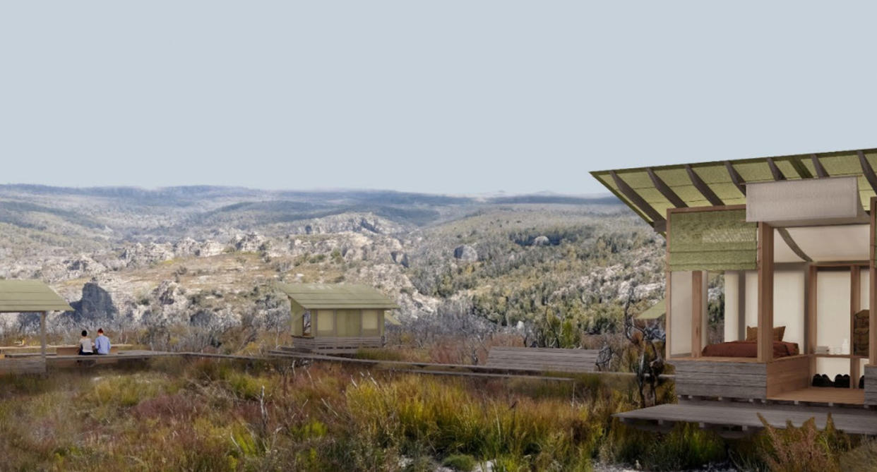 The proposed cabins are green and brown in the landscape of the Gardens of Stone conservation area in the Blue Mountains.