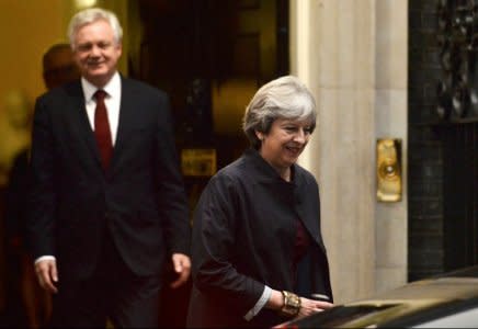 Britain's Prime Minister Theresa May leaves 10 Downing Street with the Secretary of State for departing the EU David Davis, in London, October 16, 2017. REUTERS/Mary Turner