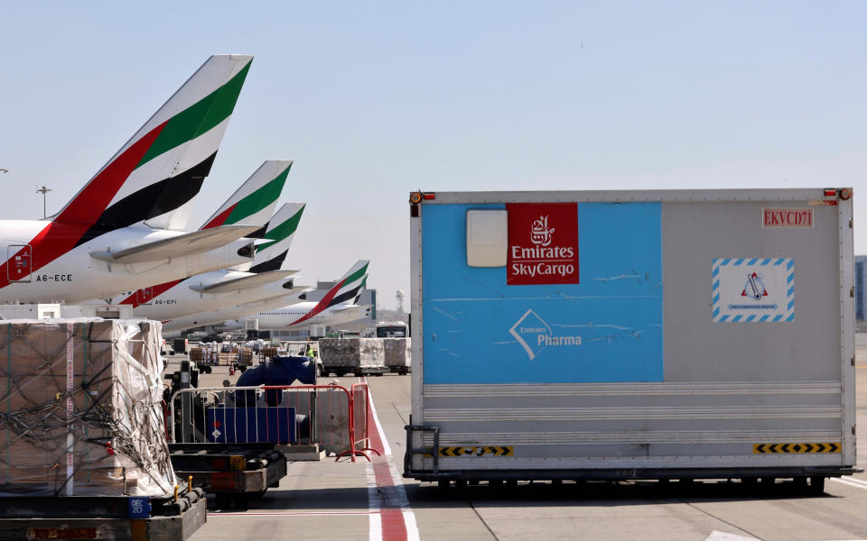 Image: An Emirates Airlines Boing 777 plane carrying a vaccine shipment at Dubai International Airport earlier this month. (Karim Shaib / AFP - Getty Images file)