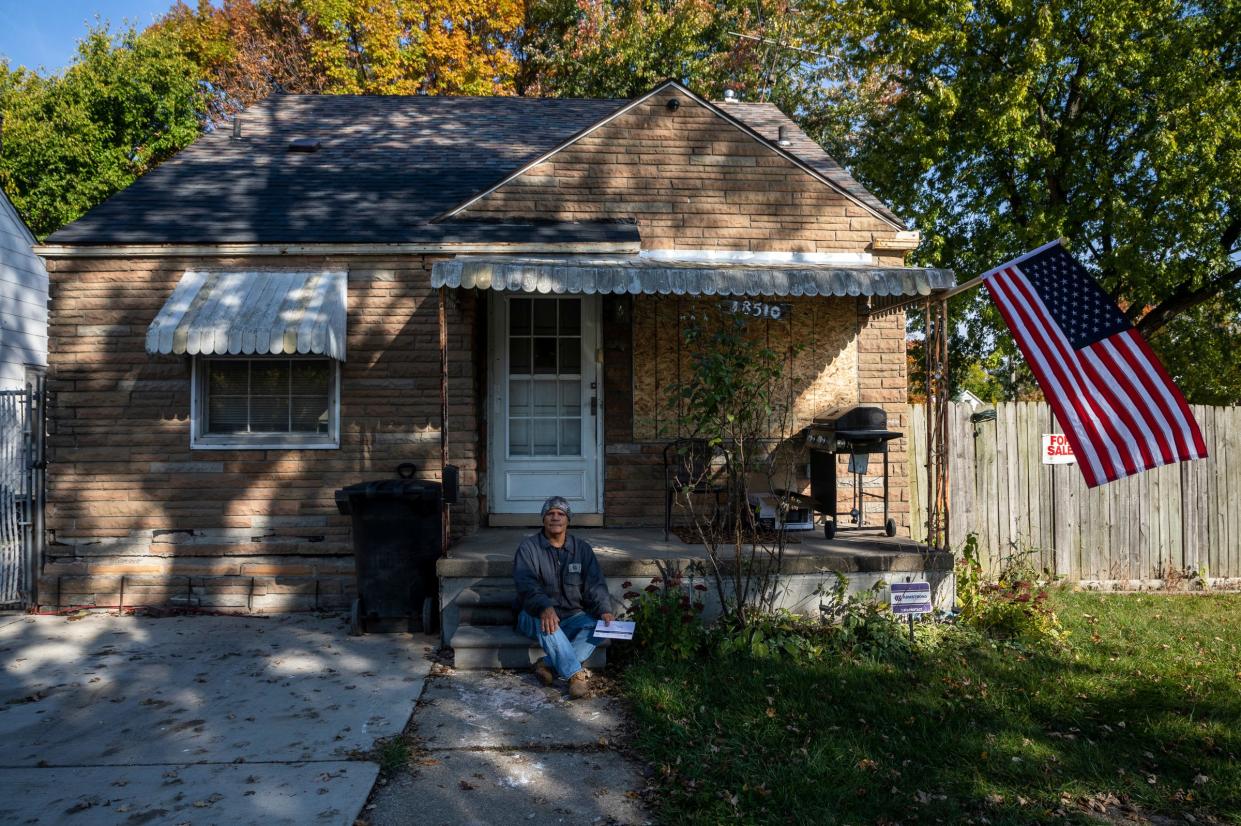 Rafael Sanchez, 68, sits outside his home in Detroit on Tuesday, Oct. 24, 2023. Sanchez filed for Pandemic Unemployment Assistance benefits in 2021 after work was only trickling in at the automotive repair business he owned. Years later, he's still waiting on those benefits even though a judge determined in July he's eligible for benefits.