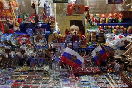 A woman sells souvenirs at Kremlin in Nizhny Novgorod, Russia, June 30, 2018. REUTERS/Damir Sagolj