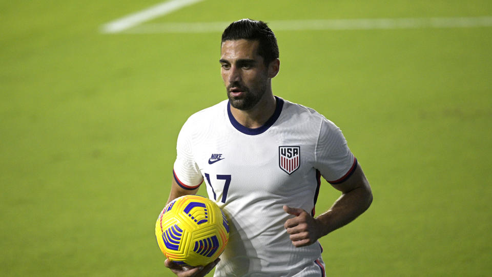 United States midfielder Sebastian Lletget (17) sets up for a corner kick during the first half of an international friendly soccer match against Trinidad and Tobago, Sunday, Jan. 31, 2021, in Orlando, Fla. (AP Photo/Phelan M. Ebenhack)