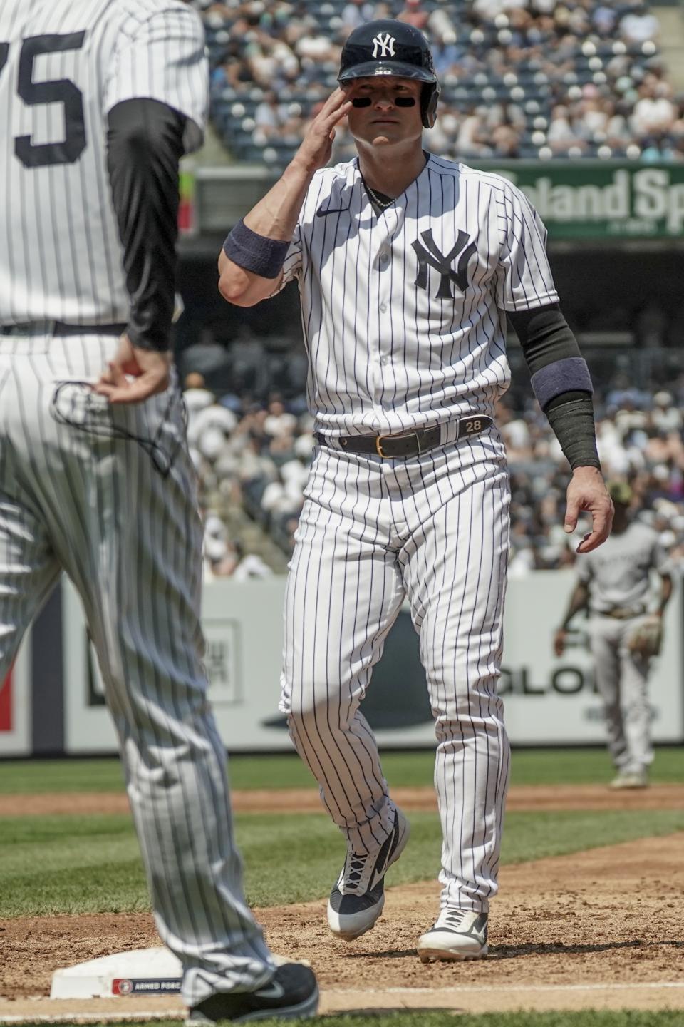 New York Yankees' Josh Donaldson (28) steps back to first base during the third inning of a baseball game against Chicago White Sox, Saturday May 21, 2022, in New York. (AP Photo/Bebeto Matthews)