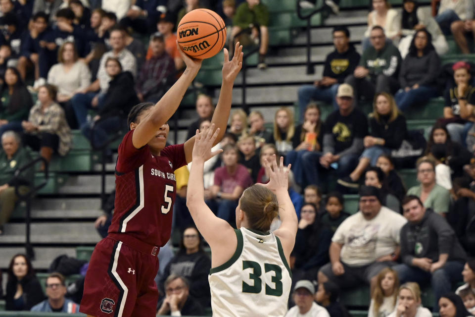 South Carolina forward Victaria Saxton (5) shoots over Cal Poly guard Maddie Willett (33) in the first half of an NCAA college basketball game, Tuesday, Nov. 22, 2022, San Luis Obispo, Calif. (AP Photo/Nic Coury)