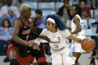 Louisville guard Yacine Diop (2) guards against North Carolina guard Madinah Muhammad (3) during the first half of an NCAA college basketball game in Chapel Hill, N.C., Sunday, Jan. 19, 2020. (AP Photo/Gerry Broome)