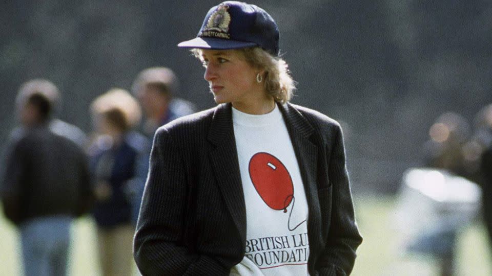 Princess Diana wearing a British Lung Foundation charity sweatshirt to a polo match. - Tim Graham Photo Library/Getty Images