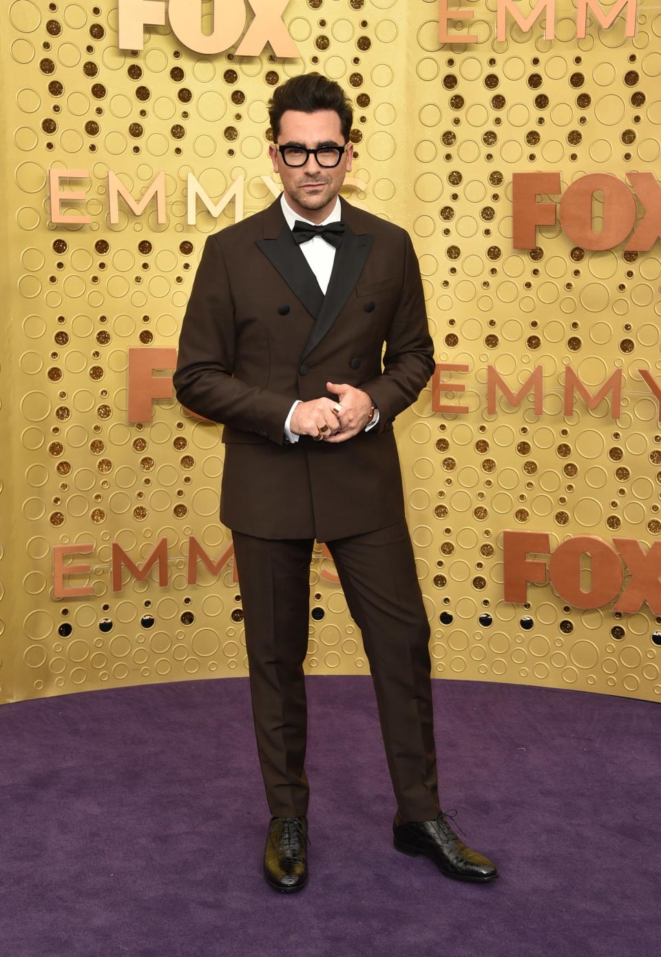 <h1 class="title">Dan Levy in Cartier jewelry</h1><cite class="credit">Photo: Getty Images</cite>