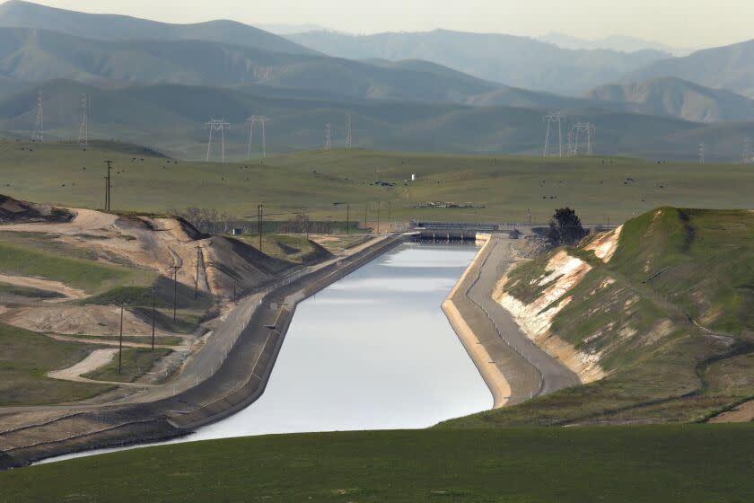 Santa Nella, CA, January 18, 2022 -The Delta-Mendota Canal runs south along the western edge of the San Joaquin Valley, parallel to the California Aqueduct for most of its journey, but it diverges to the east after passing San Luis Reservoir, which receives some of its water. The water is pumped from the canal and into O'Neill Forebay. Then it is pumped into San Luis Reservoir by the Gianelli Pumping-Generating Plant. (Carolyn Cole / Los Angeles Times)