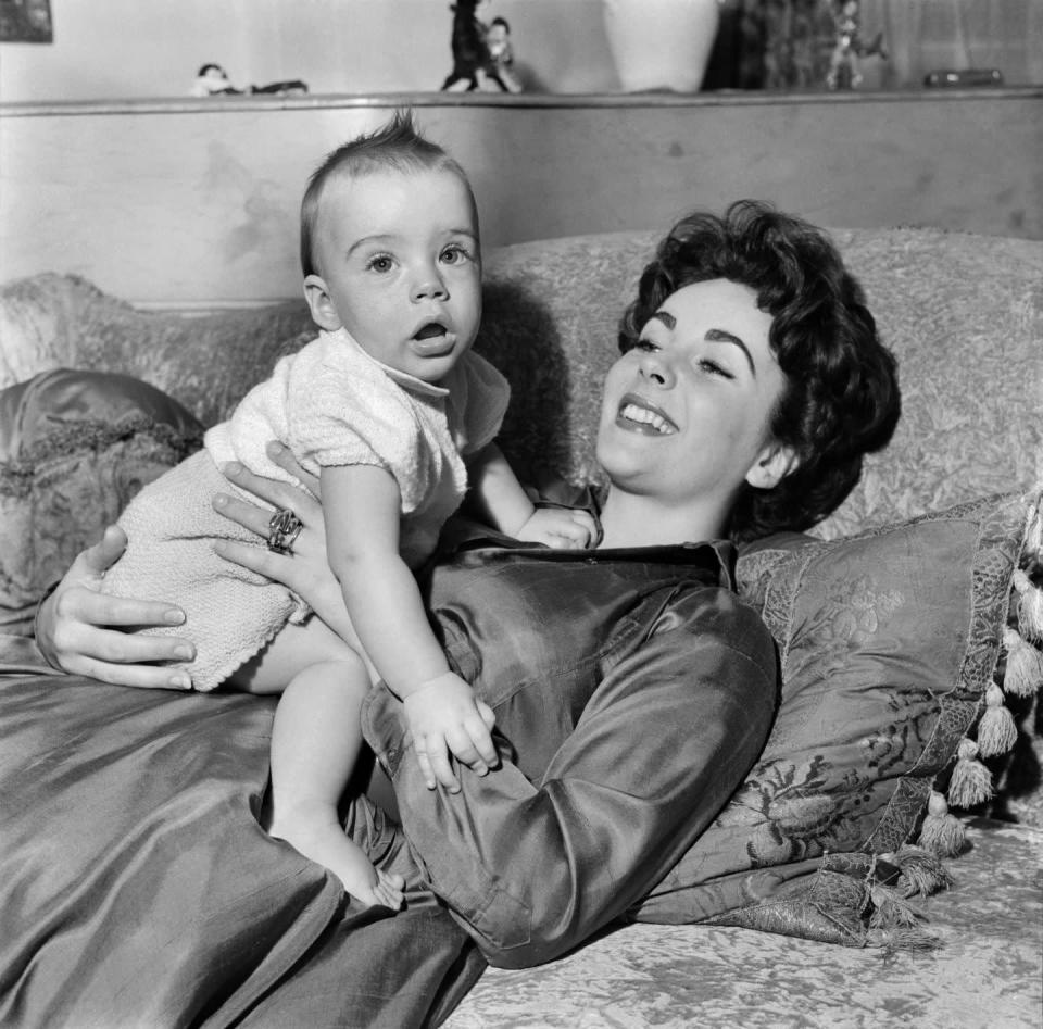 <p>Elizabeth and Michael Wilding welcomed their first child together, a son named Michael Jr., in 1953. </p>