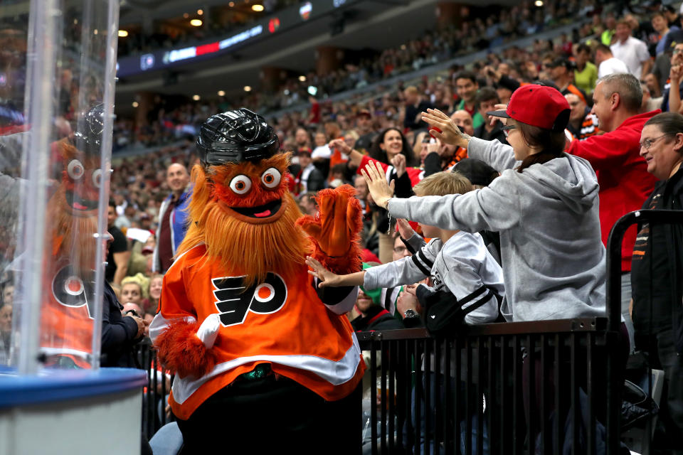 PRAGUE, CZECH REPUBLIC - OCTOBER 04: The Philadelphia Flyers mascot "Gritty" interacts with fans in the third period against the Chicago Blackhawks during the NHL Global Series Challenge 2019 match at O2 Arena on October 4, 2019 in Prague, Czech Republic.  (Photo by Chase Agnello-Dean/NHLI via Getty Images)