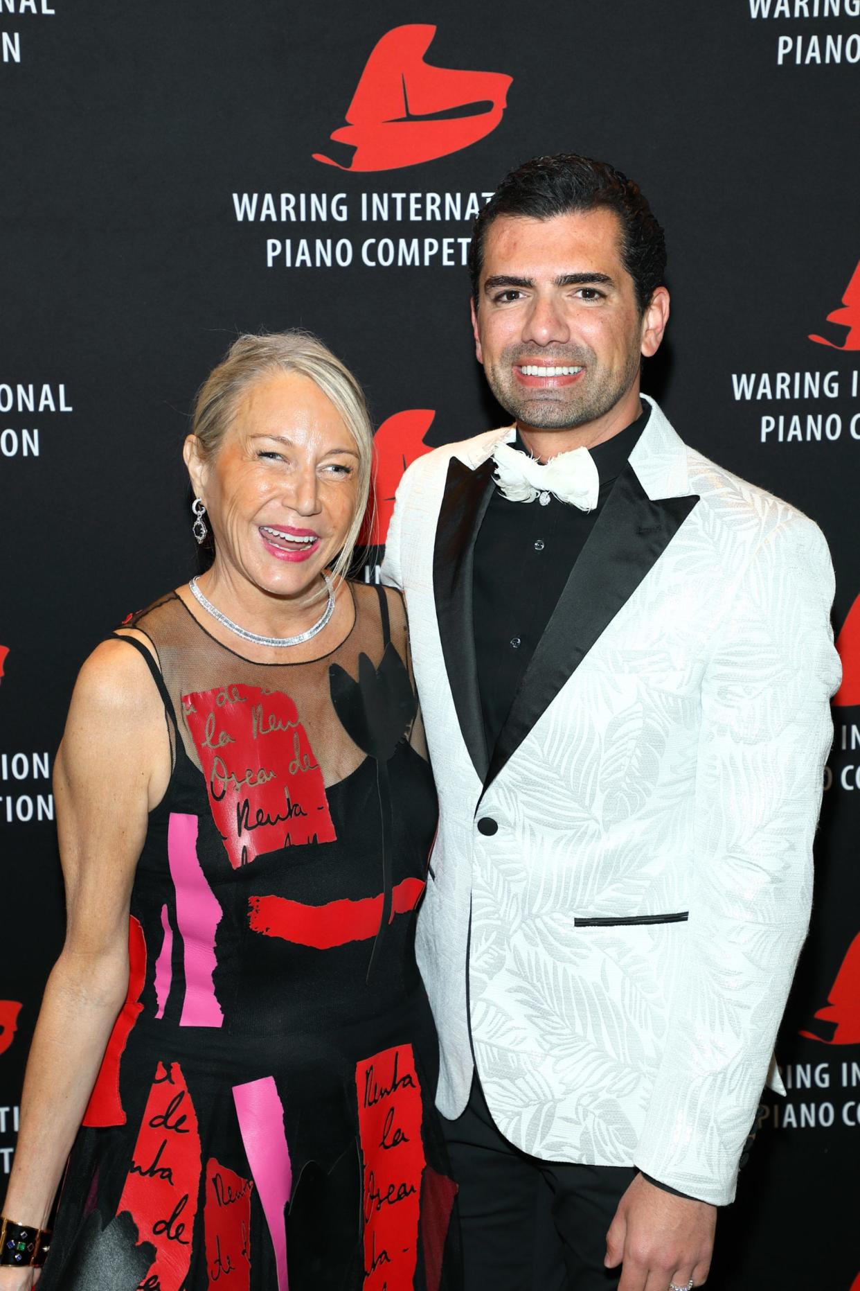 Patti Grundhofer and honoree Dennis Flaig-Moore attend the Virginia Waring International Piano Competition on March 28, 2022.