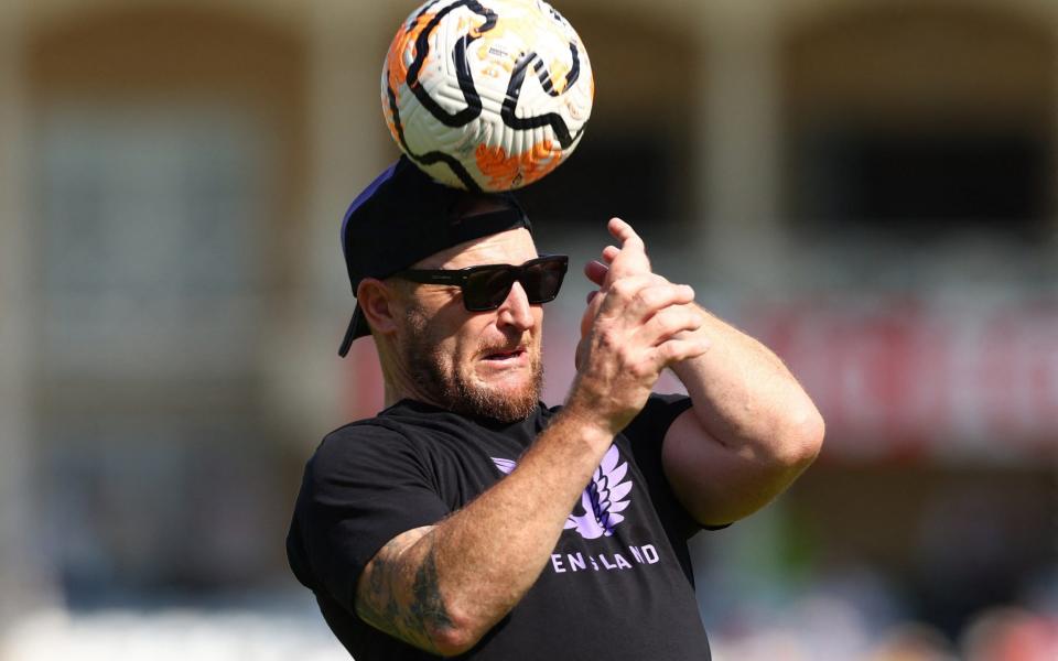 Brendon McCullum takes part in a game of football with the England players