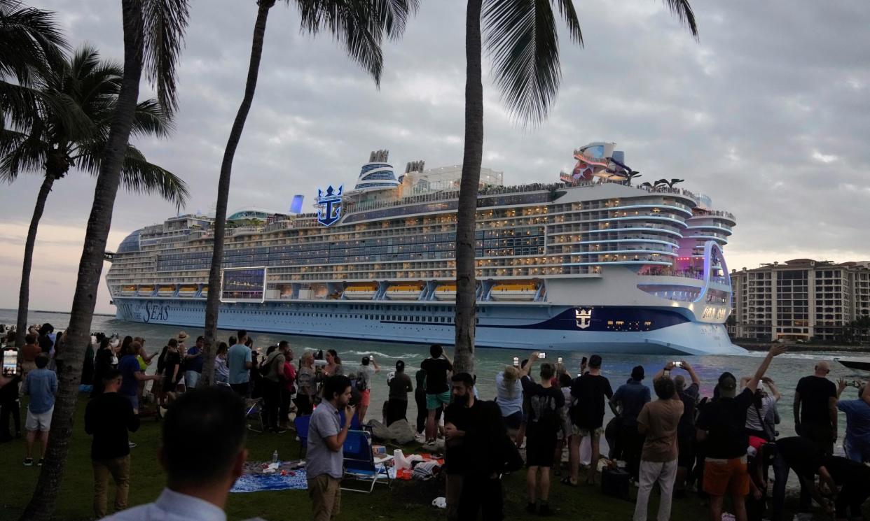 <span>The Icon of the Seas sails out of Miami on its first public cruise in January.</span><span>Photograph: Rebecca Blackwell/AP</span>