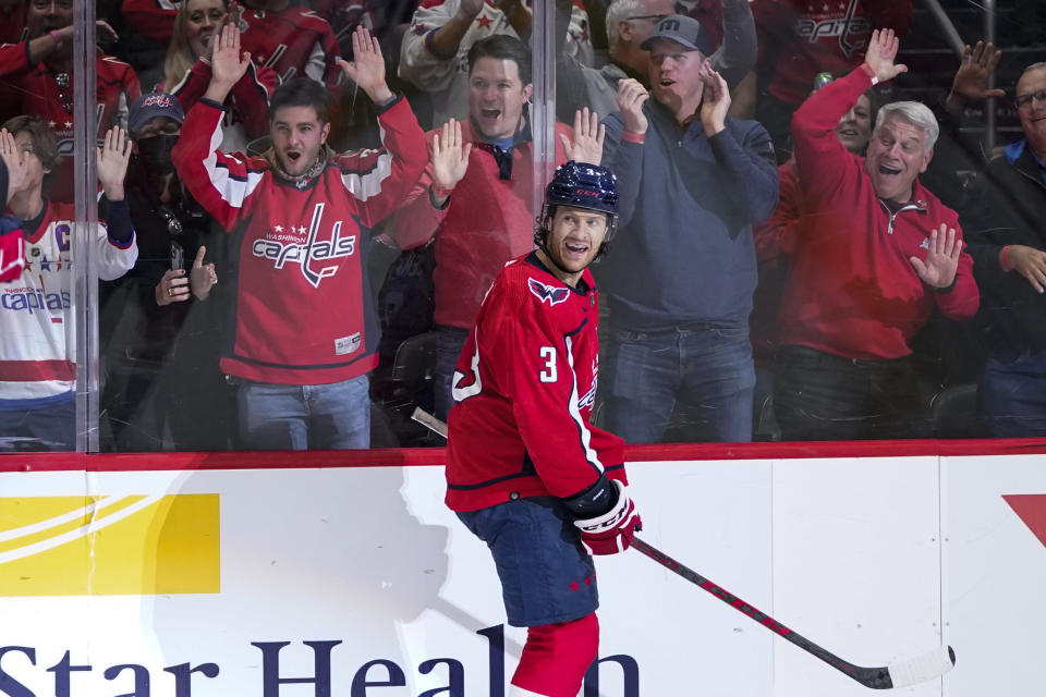 Washington Capitals defenseman Nick Jensen (3) smiles after his goal during the first period of the team's NHL hockey game against the Colorado Avalanche, Tuesday, Oct. 19, 2021, in Washington. (AP Photo/Alex Brandon)