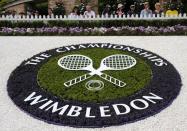 FILE PHOTO: A Wimbledon logo is seen inside the grounds at the Wimbledon tennis championships in London