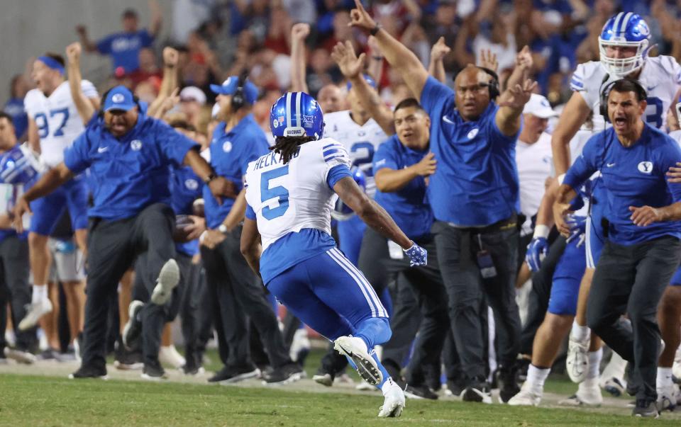 Brigham Young Cougars cornerback Eddie Heckard (5) celebrates a sack near the end of the game at Razorback Stadium in Fayetteville on Saturday, Sept. 16, 2023. BYU won 38-31. | Jeffrey D. Allred, Deseret News