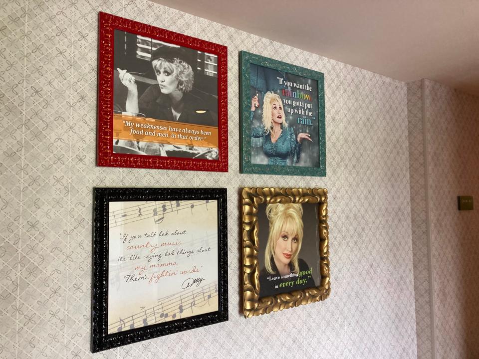 Photos of Dolly Parton in the hallway at the Dollywood DreamMore Resort.