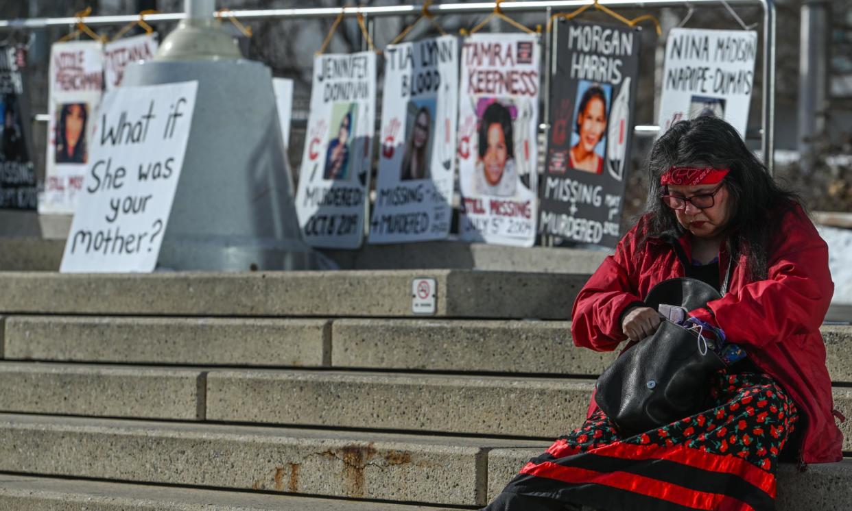 <span>People unite to honor missing and murdered Indigenous women on International Women’s Day on 8 March 2024 in Edmonton, Alberta.</span><span>Photograph: Anadolu/Getty Images</span>