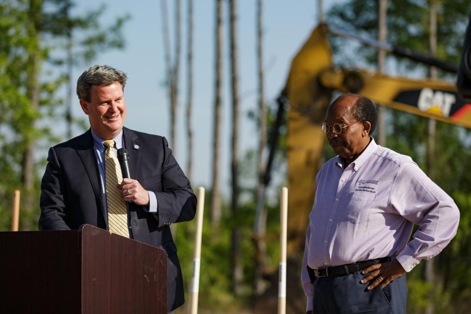 Mayor John Dailey, left and City Commissioner Curtis Richardson speak about the importance of the development of Independence Landing, housing property will provide affordable housing aimed forÊadults withÊcognitive, intellectual, developmental or physical disabilities and provide on-site support staff, during a groundbreaking ceremony for the project in Southwood on Tuesday, April 19, 2022.