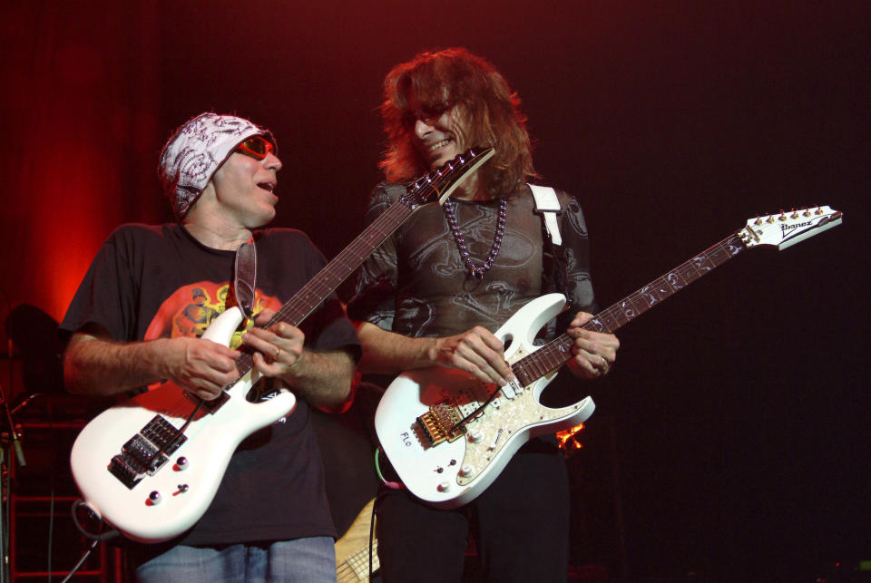 Joe Satriani (left) and Steve Vai perform at the Royal Albert Hall in London