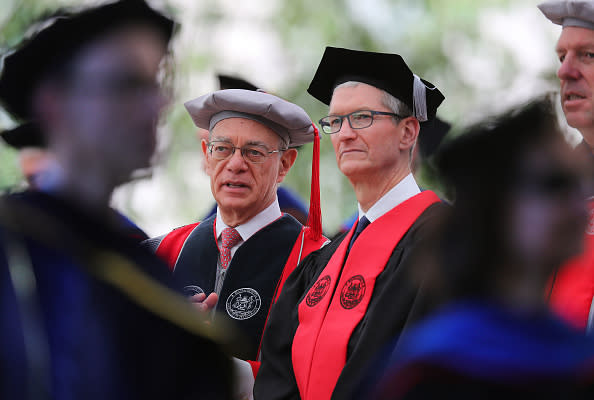 MIT President L. Rafael Reif (left) chats with Cook during the procession. (John Tlumacki/The Boston Globe)