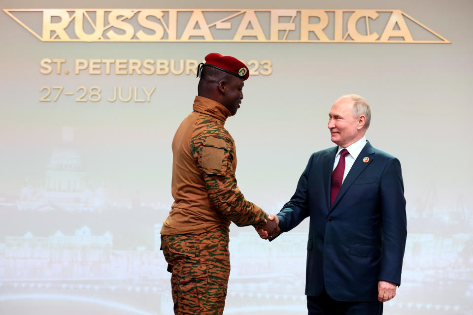 Burkina Faso's Capt. Ibrahim Traore, left, and Russian President Vladimir Putin at the Russia Africa Summit in St. Petersburg, on July 27, 2023. (Sergei Bobylev / TASS Host Photo Agency Pool Photo via AP)