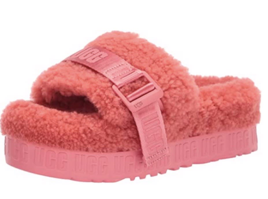 Fuzzy fluffita slippers on a cold day will get you through this winter. (Photo: Amazon)
