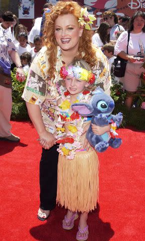 <p>MediaPunch Inc/Alamy Stock Photo</p> Wynonna Judd with her daughter Grace in 2002.