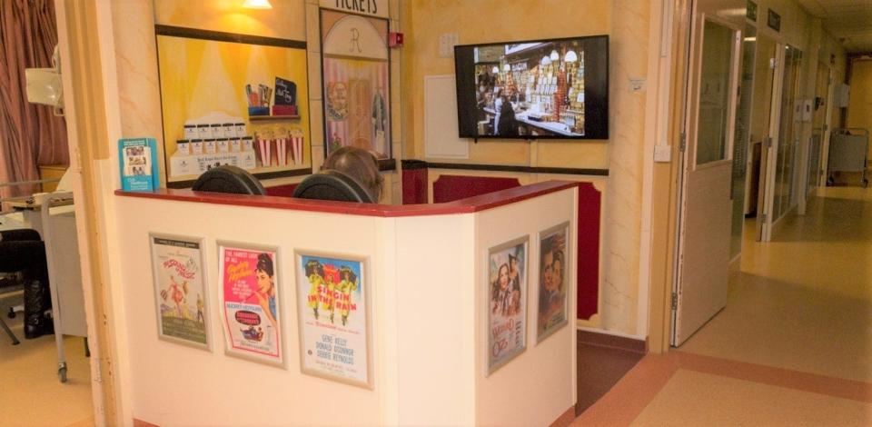 Cinema booth at the Hull Royal Infirmary, where patients can watch footage of old street scenes and sporting events from the 1950s and 1960s (PA)