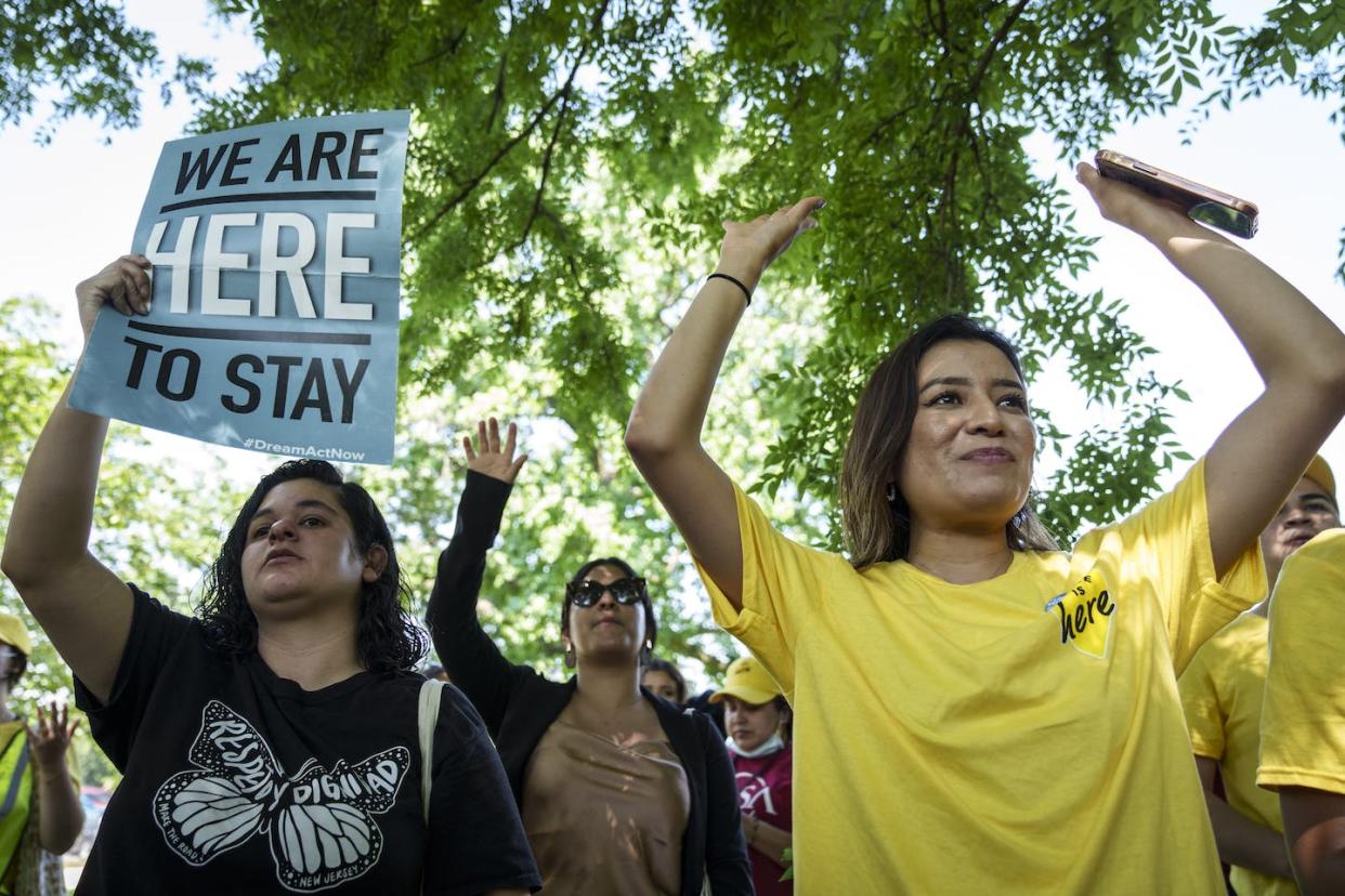 Immigrant advocates protest near the U.S. Capitol on June 15, 2022 <a href="https://media.gettyimages.com/photos/immigration-advocates-rally-to-urge-congress-to-pass-permanent-for-picture-id1241326933" rel="nofollow noopener" target="_blank" data-ylk="slk:Drew Angerer/Getty Images;elm:context_link;itc:0;sec:content-canvas" class="link ">Drew Angerer/Getty Images </a>