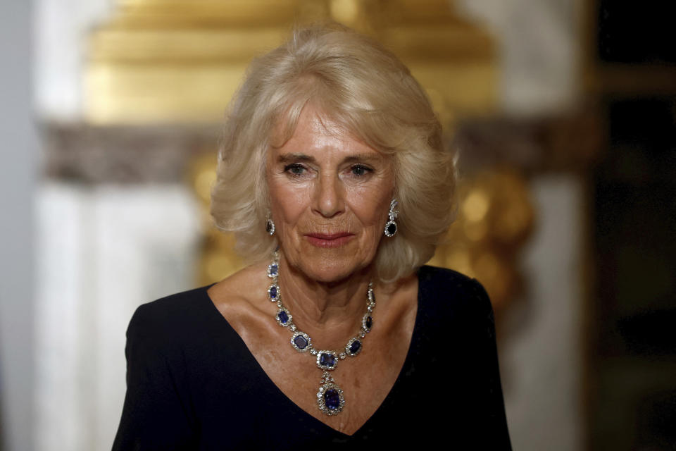 Britain's Queen Camilla attends a state dinner in the Hall of Mirrors at the Chateau de Versailles, west of Paris, Wednesday, Sept. 20, 2023 in Versailles. (Benoit Tessier/Pool via AP)