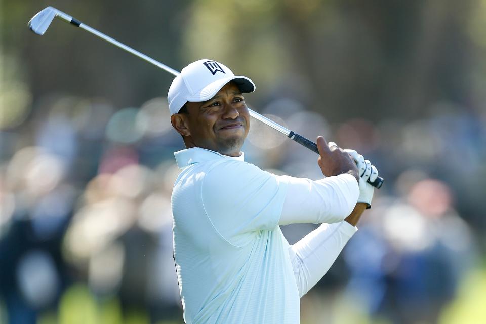 Tiger Woods plays his second shot on the 18th hole during the second round of the Valspar Championship at Innisbrook Resort Copperhead Course on March 9, 2018 in Palm Harbor, Florida. (Getty Images)