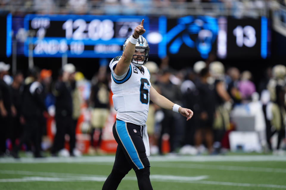 Carolina Panthers quarterback Baker Mayfield (6) celebrates a touchdown throw during the second half of an NFL football game against the New Orleans Saints, Sunday, Sept. 25, 2022, in Charlotte, N.C. (AP Photo/Jacob Kupferman)