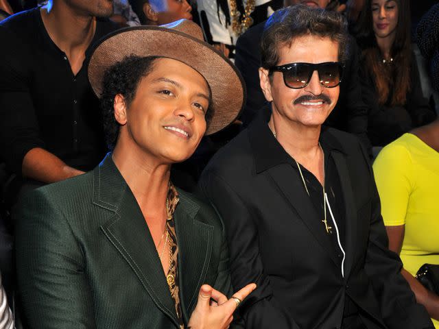 <p>Kevin Mazur/WireImage</p> Bruno Mars and his father Peter Hernandez attend the 2013 MTV Video Music Awards on August 25, 2013.