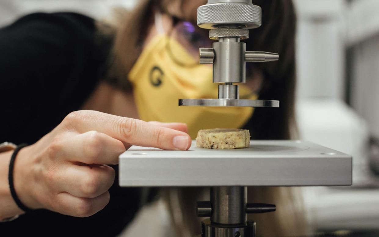 Marion Gaff, food engineer at Gourmey, carries out density tests on lab-grown foie gras at the start-up's laboratory in Paris