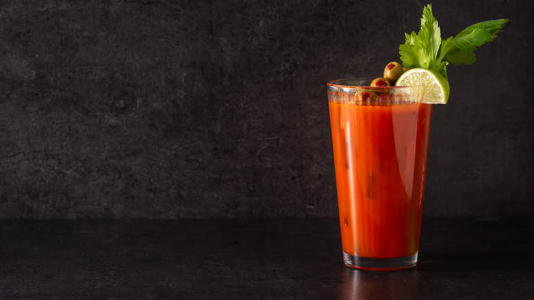 Bloody mary with celery, olives