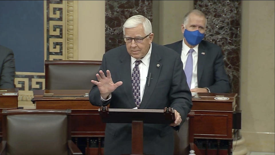 FILE - In this Dec. 2, 2020 file photo taken from U.S. Senate video, Wyoming's low-key senior U.S. Sen. Mike Enzi says goodbye to colleagues, in Washington. Ednzi, remained hospitalized Monday, July 26, 2021, with a broken neck and ribs three days after a bicycle accident outside his hometown. (U.S. Senate via AP, file)