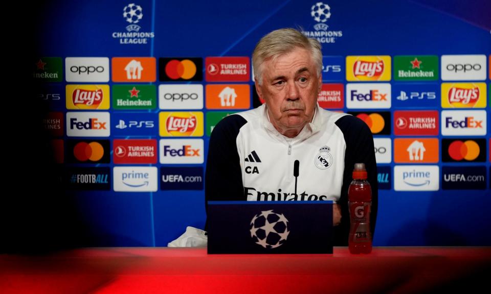 <span>Carlo Ancelotti doing his best Carlo Ancelotti.</span><span>Photograph: Matthias Schräder/AP</span>