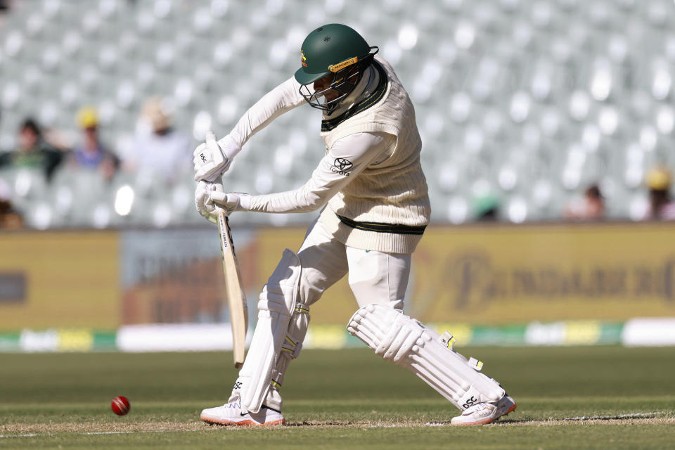 Australia's Usman Khawaja bats against the West Indies on the first day of their cricket test match in Adelaide, Australia, Wednesday, Jan. 17, 2024. (AP Photo/James Elsby)